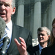 Plaintiff Abigail Fisher with attorney after Supreme Court heard arguments. (Mark Wilson/Getty Images News)
